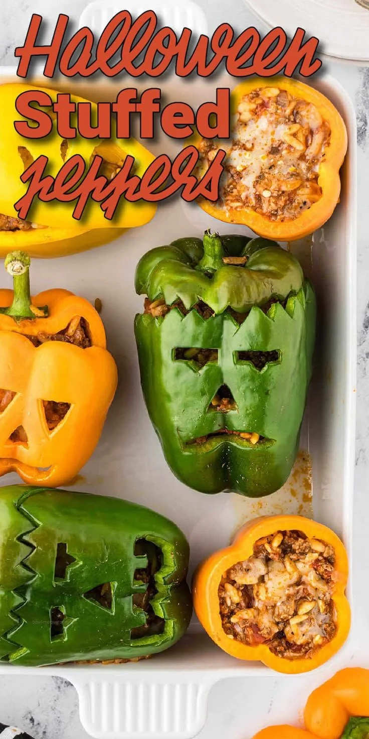Halloween stuffed peppers served on a festive table with spooky decorations.