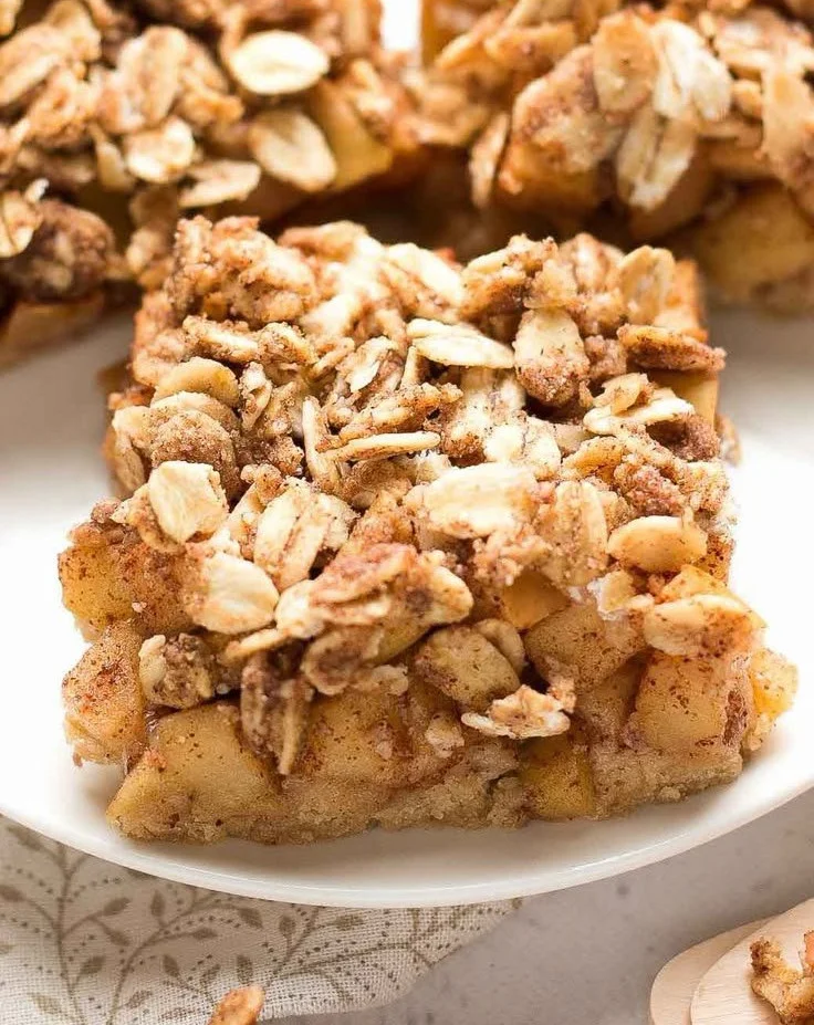 Healthy small batch apple crumble bars topped with oat crumble and apple filling