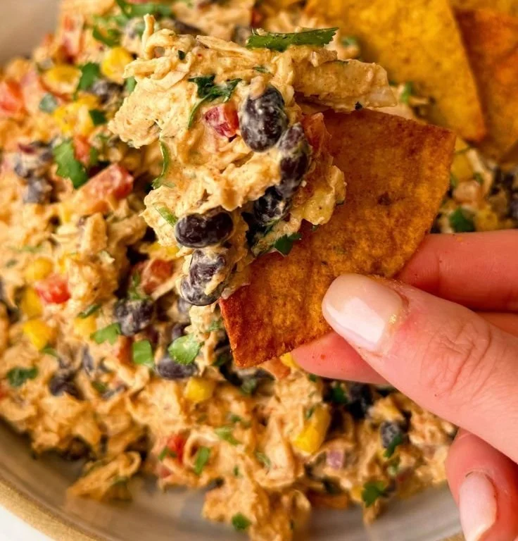 High-protein Southwest chicken salad with fresh ingredients and vibrant colors.