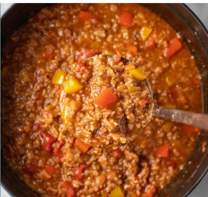High protein stuffed pepper soup with colorful peppers and savory ingredients