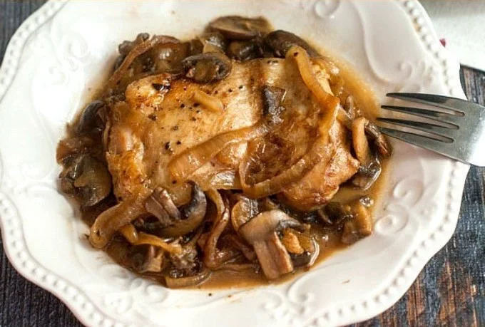 Plate of low carb balsamic chicken with onions and mushrooms