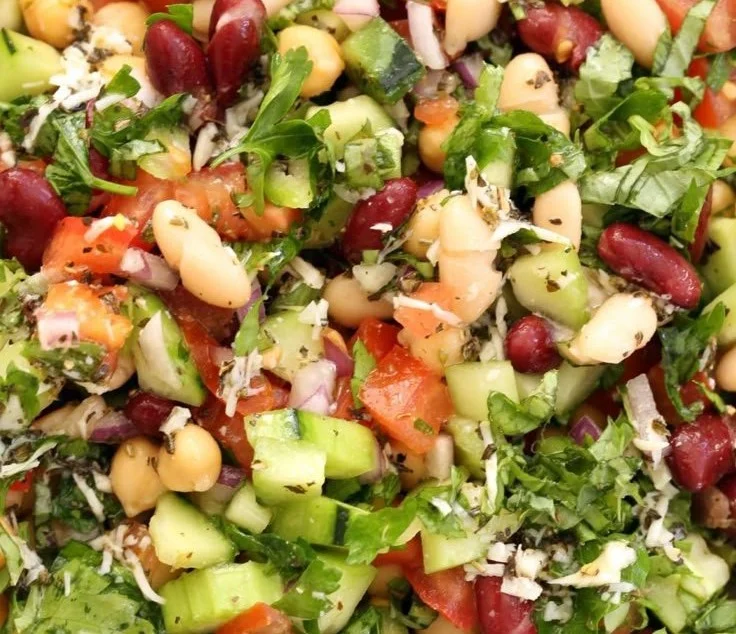 Colorful Mediterranean Bean Salad with fresh veggies and beans in a bowl