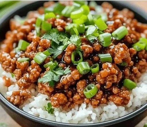 Delicious honey garlic ground turkey served on a plate with vegetables