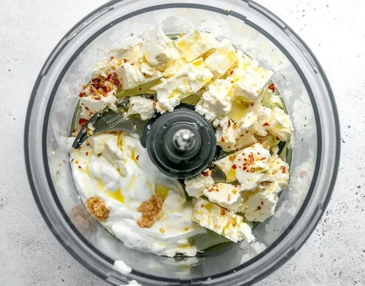 Creamy whipped feta dip served with fresh vegetables and pita bread