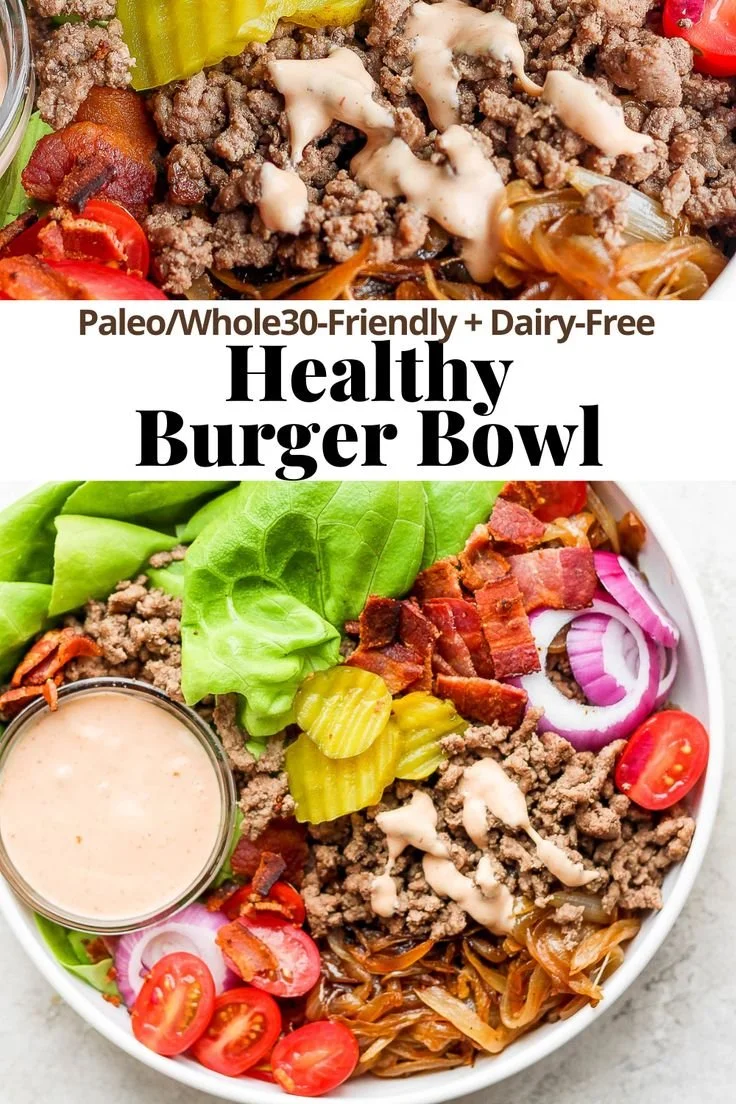 Delicious Burger Bowl topped with special sauce, showcasing vibrant ingredients.