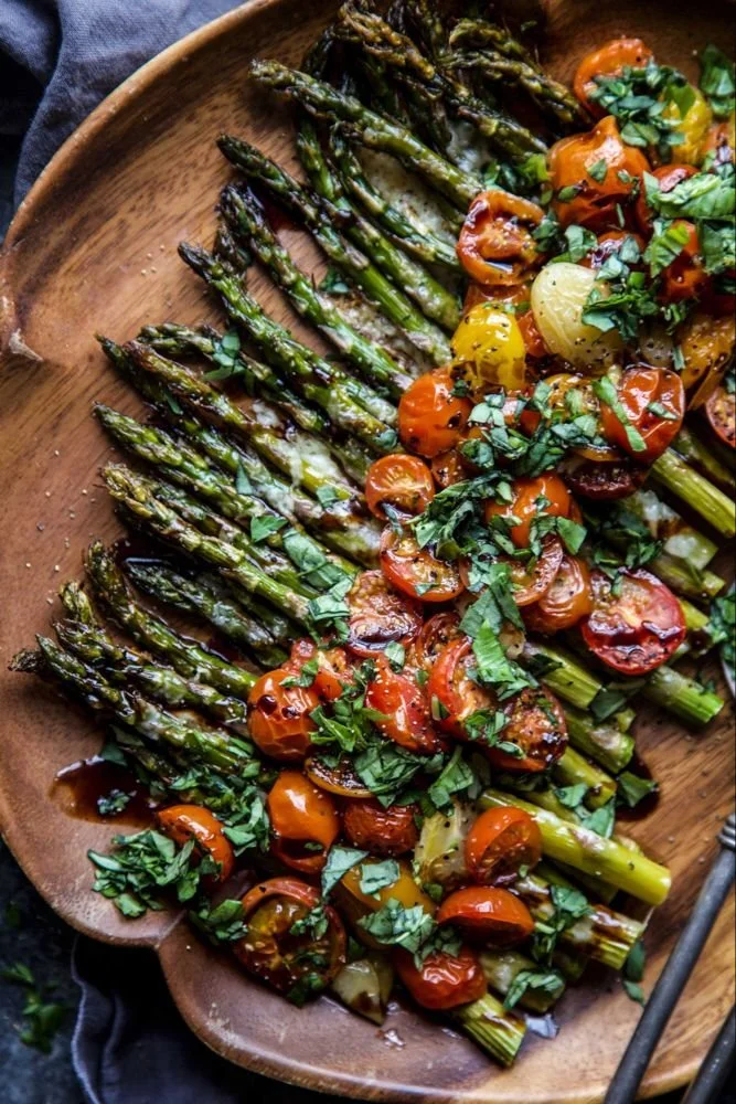 Plated Caprese Roasted Asparagus with mozzarella and tomatoes