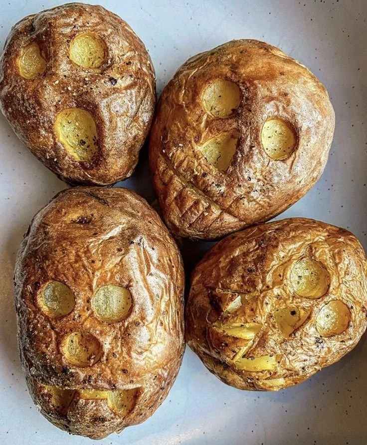 Delicious bagels served for breakfast with spooky Halloween-themed treats.