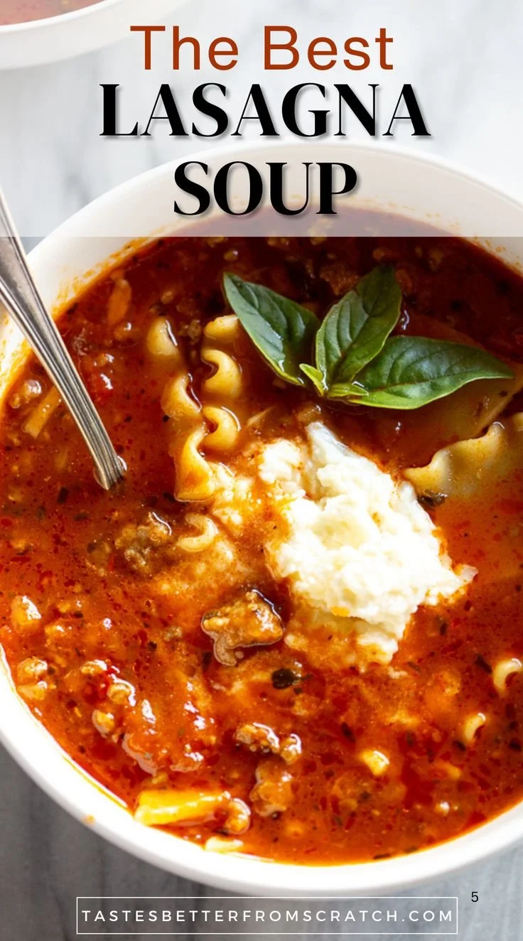 A bowl of Easy Lasagna Soup topped with cheese and herbs, showcasing a hearty meal.