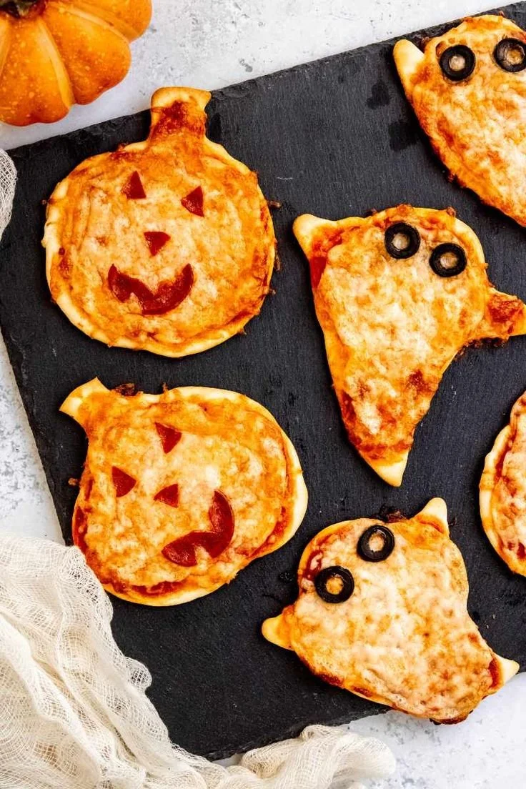 Mini Halloween pizza decorated for a festive Halloween party