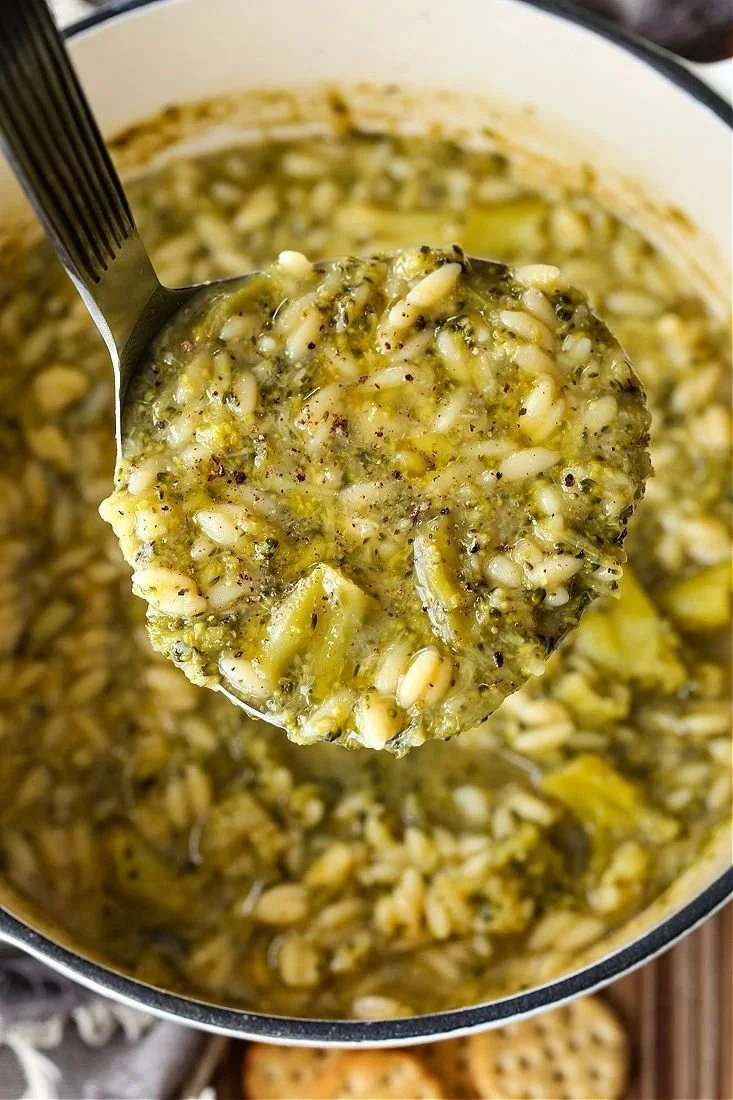 Bowl of delicious Italian broccoli soup garnished with herbs