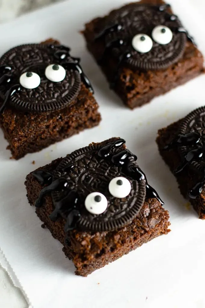 Nutella spider brownies decorated with chocolate spiders for Halloween
