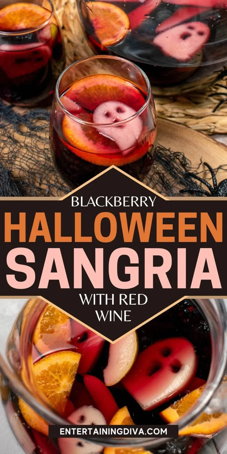 Spooky blackberry Halloween sangria in a festive glass with fruit garnishes.
