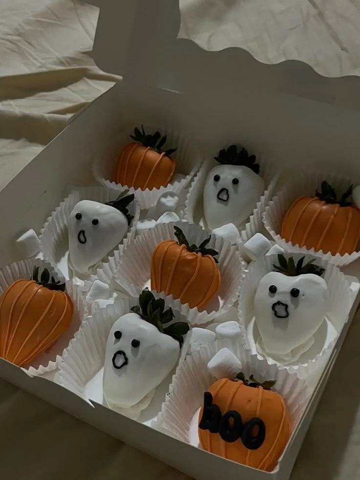 Spooky cute Halloween berries decorated for festive treats