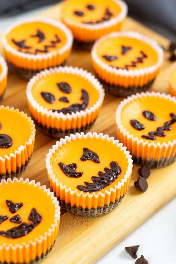 Spooky mini cheesecakes decorated for Halloween festivities