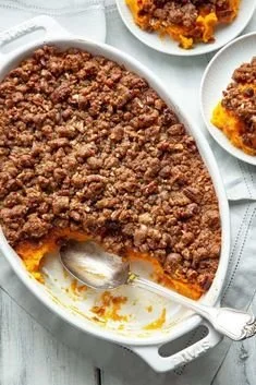 Delicious sweet potato casserole topped with pecans, ideal for holidays