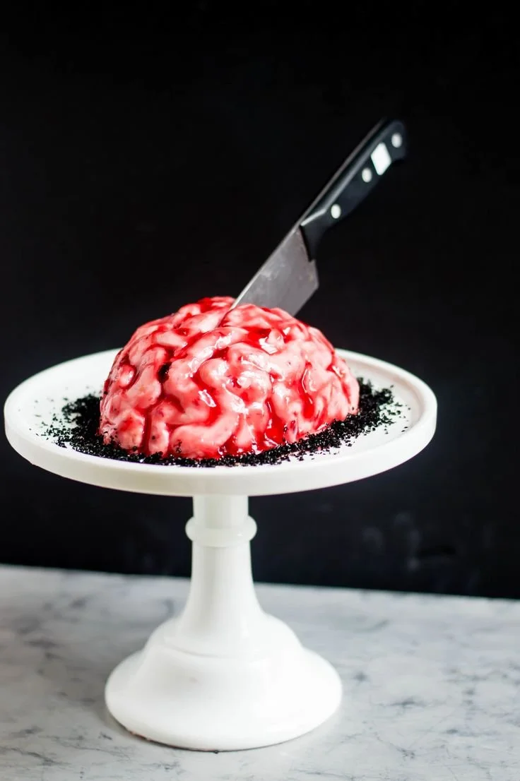 Zombie Brains Cheesecake Dip served in a spooky Halloween bowl